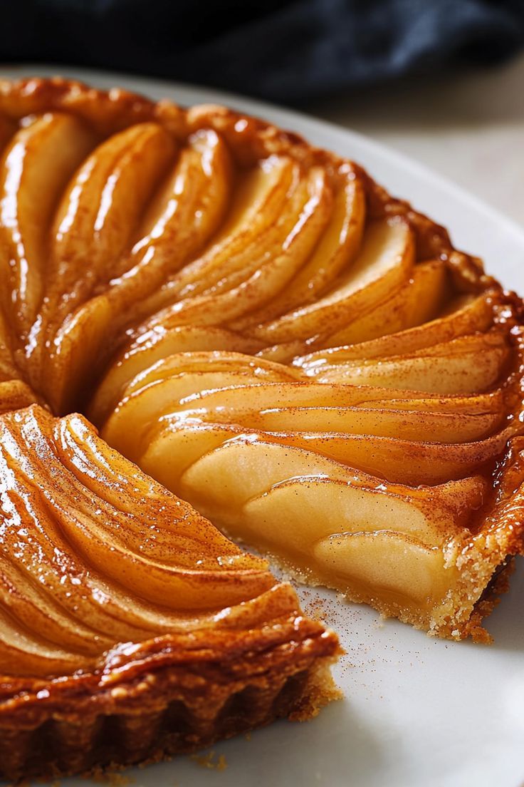 "close up of apple pie missing one piece"