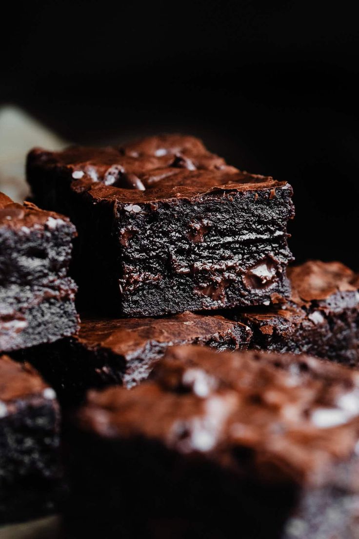 "fudgy chocolate brownies with a shiny top"