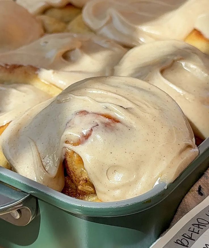 "Freshly baked frosted cinnamon rolls, a delicious upgrade from a traditional material subscription box"